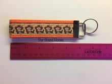 Load image into Gallery viewer, Key Fob - Cowboys on Orange
